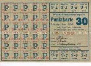 Bezugskarte der DDR für Textilien aus dem Jahr 1952 mit Propaganda für den Fünfjahrplan auf der Rückseite