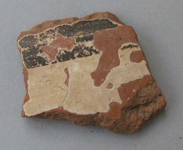 Clay shard of a vessel