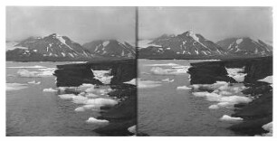 Ebeltofthafen, Spitzbergen (Norwegen). Treibeis am felsigen Ufer