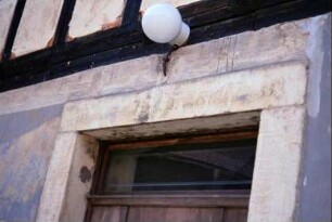 Hof Dietzel, Türstein mit Inschrift
