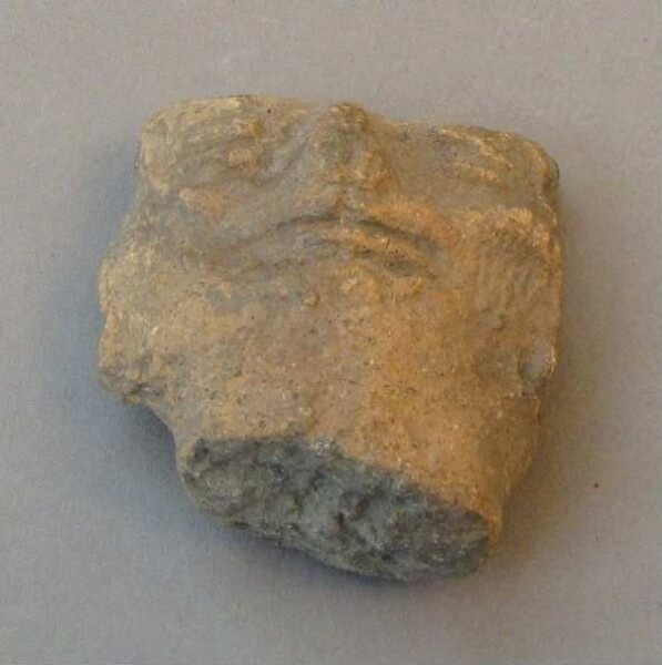 Clay head (fragment)