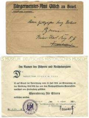 Urkunde zur Verleihung des "Ehrenkreuzes für Eltern" durch die NS-Regierung (mit Kuvert) - Personenkonvolut