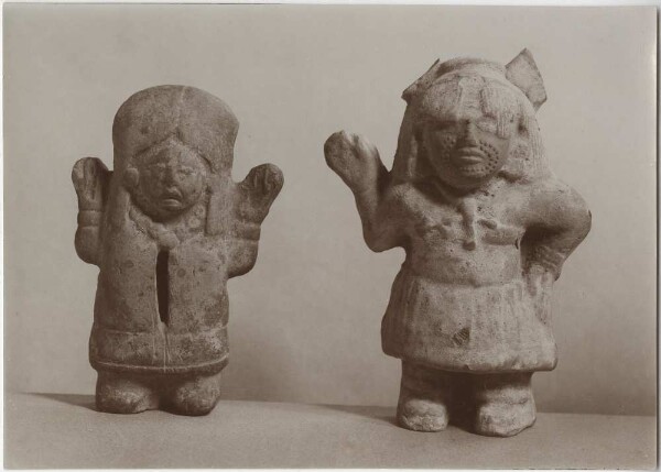 Two clay figures