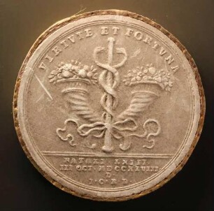 Ein mit zwei Füllhörnern zusammengebundener Merkurstab (Revers)