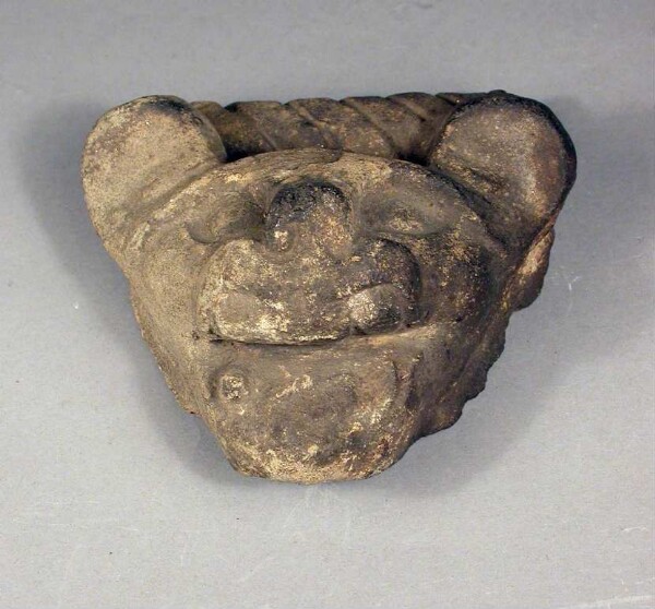 Fragment of a clay vessel