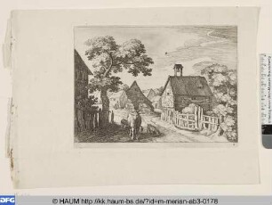 Dorfstraße mit Kuh von vorn