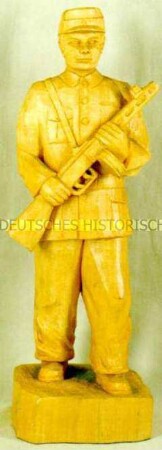 Skulptur "Soldat mit Maschinenpistole"