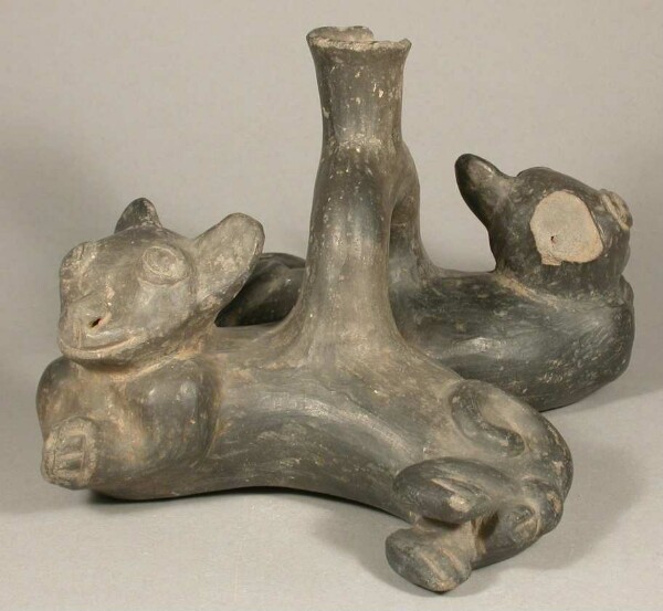 Zoomorphic pair of figures