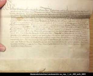 Graf Enno II. von Ostfriesland belehnt den Junker Balthasar von Esens mit der Herrlichkeit Esens außer Dornum Anhängendes Siegel verloren