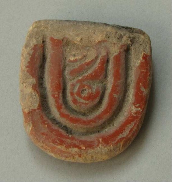 Handle of a clay vessel (fragment)