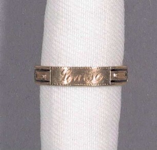 Goldener Fingerring mit Haareinlage in geschmückten Klappen