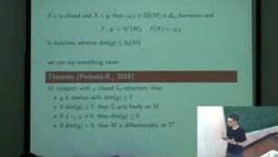 Closed G2-structures with symmetry