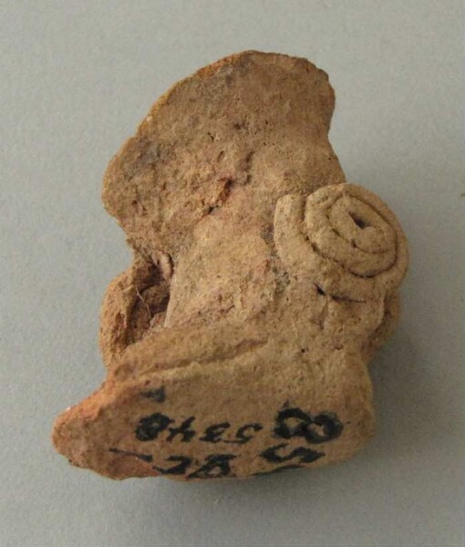 Leg of a clay figure