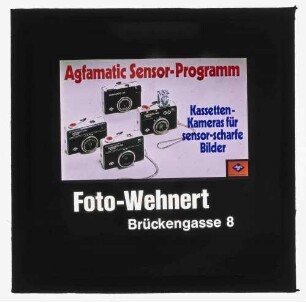 Werbetext mit Foto "Agfamatic Sensor-Programm - Kassetten-Kameras für sensor-scharfe Bilder" darunter "Foto Wehnert Brückengasse 8"