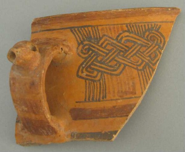 Fragment of a clay vessel