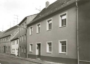 Belgern, Lindenstraße 29/32. Wohnhäuser (1801/1850, Nr. 29; um 1800, Nr. 30, 32). Straßenansicht