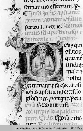 Missale Romanum : Textseite mit historisierter Initiale D: Martyrium des Evangelisten Johannes