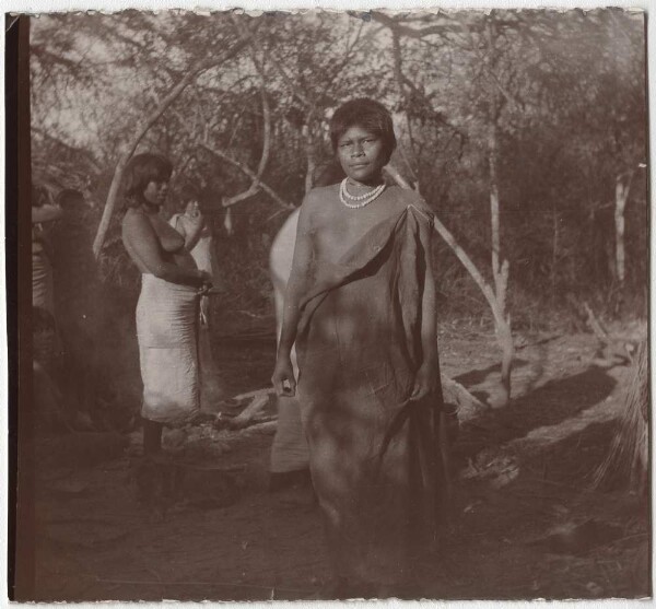 Chiriguano with Tipoy, behind him Mataco woman