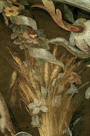 Ceres, gerahmt von zwei Korngarben, Blumen und Störchen