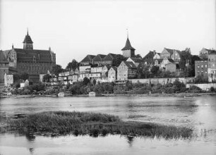 Marienburg (Malbork/Polen). Ansicht des Ortes mit einem Teil des Hochschlosses von Westen über die Nogat