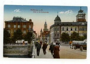 "Blick in die Kaiserstraße" von der Neckarbrücke aus (untere Kaiserstraße), mit Hauptpost, im Hintergrund der Kiliansturm