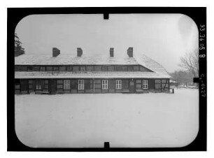 Baruth/Mark-Glashütte, Hüttenweg 8. Arbeiterwohnhaus (um 1840). Gartenfront