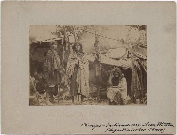 "Churupi Indians in front of their huts"