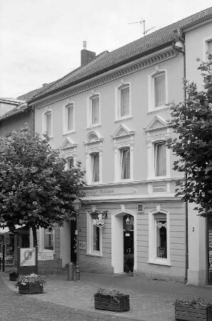 Wohn- und Geschäftshaus (ehem. Gasthaus Malkmus) (Wohn- und Geschäftshaus); Hünfeld, Hauptstraße 16