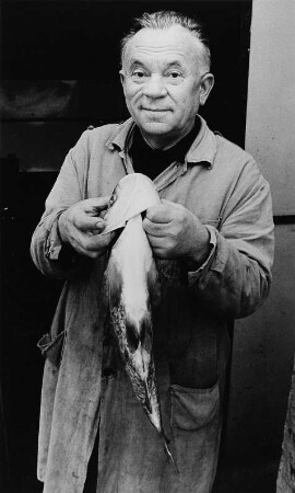 Mann mit einem Fisch