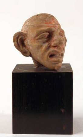 Grotesker Männerkopf