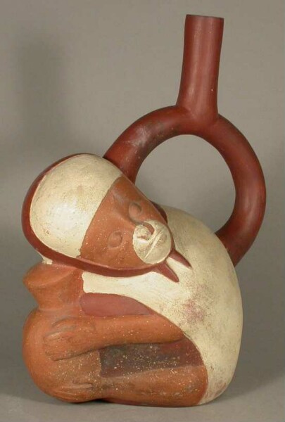 Figure vessel with stirrup spout