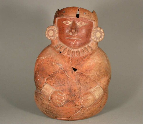 Seated anthropomorphic figure