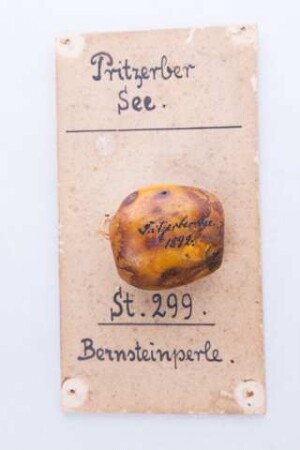 Orangefarbene Bernsteinperle