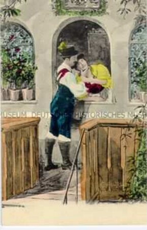 Liebespaar in bayrischer? Tracht am Fenster
