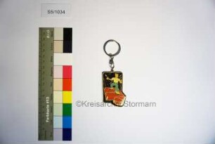 Schlüsselanhänger der Kreissparkasse Stormarn mit stilisiertem Logo der Sparkasse