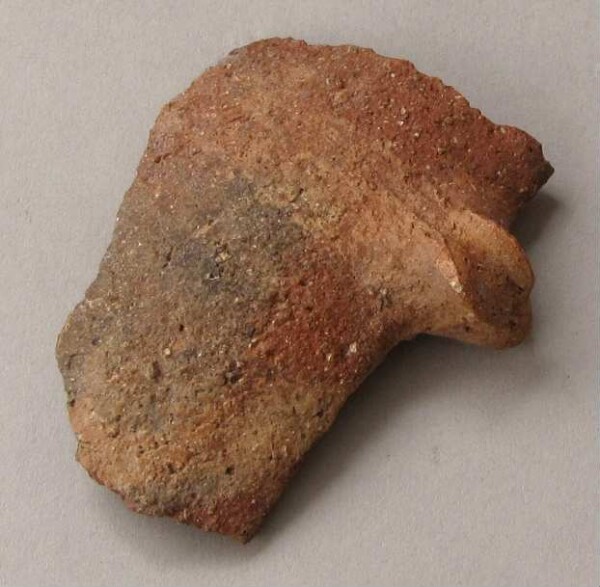 Fragment of a clay vessel