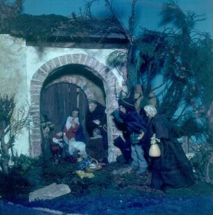 Weihnachtskrippe "Anbetung der Hirten" (Fulda). Wachsfiguren, bekleidet
