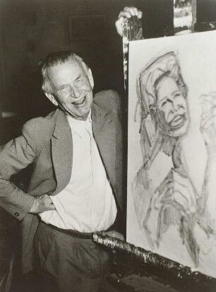 Otto Dix, lachend im Atelier