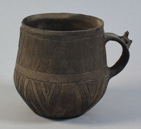 Clay jug with handle