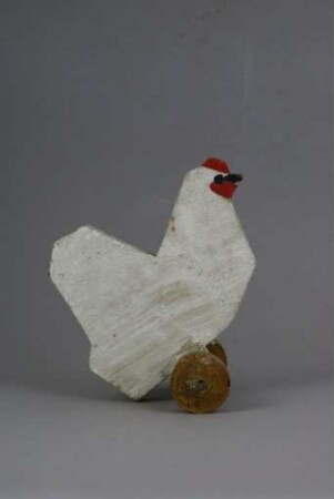 Hölzernes Huhn auf Rädern