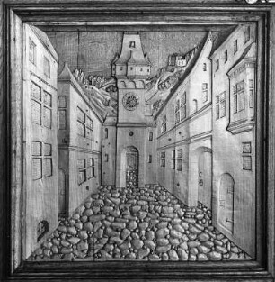 Östliche Tür mit Relief-Türfeldern : Östliche Tür mit Relief-Türfeldern. Holz, geschnitzt (1539). Untere Türfüllung mit Straßenbild. Syrgenstein (Markt Heimenkirch), Schloss, 2. Obergeschoss, Bibliothek
