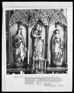 nördlicher Nebenaltar, Mittelschrein: Maria mit Kind, zwei Heilige