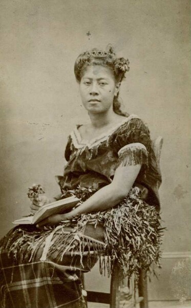 "Woman in festive dress, Samoa"