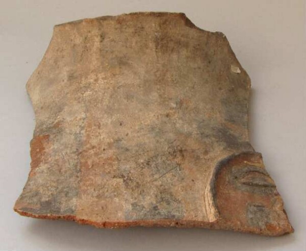 Fragment of a clay vessel