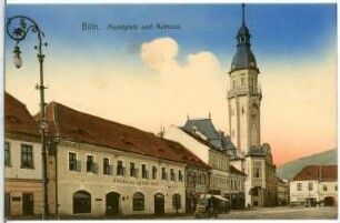 Bilin. Marktplatz und Rathaus