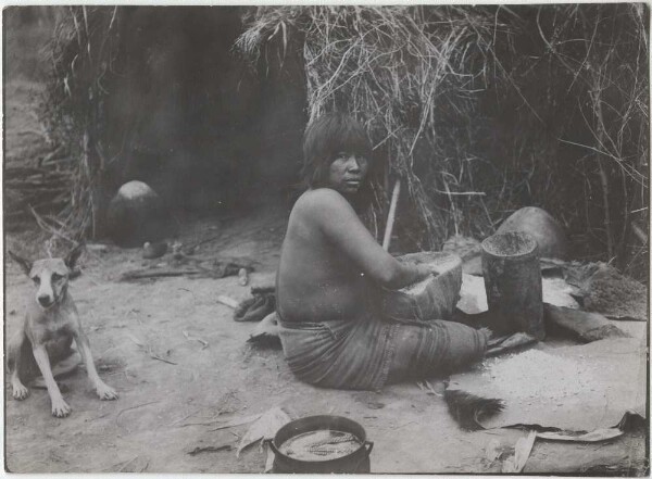 Ashluslay preparing algarrobo flour