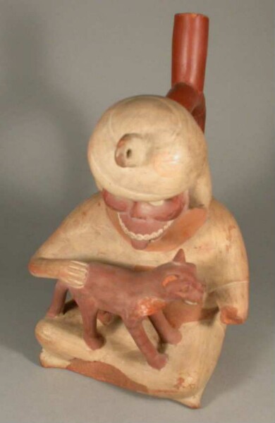 Sitzende anthropomorphe Figur mit einem Feliden