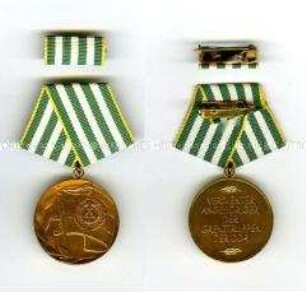 Medaille zum Titel "Verdienter Angehöriger der Grenztruppen der DDR" mit Interimsspange, 1. Form