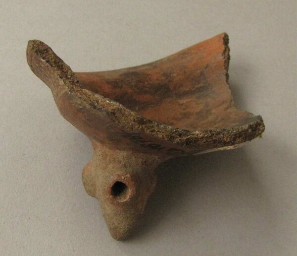 Foot fragment of a tripod clay bowl