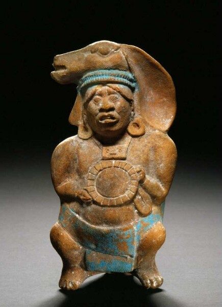 Figure of dwarf with mirror in the hands